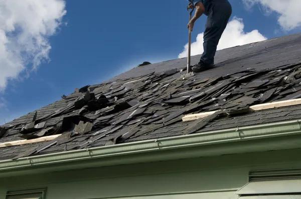 Repairing or Replacing Your Roof After Storm or Hail Damage